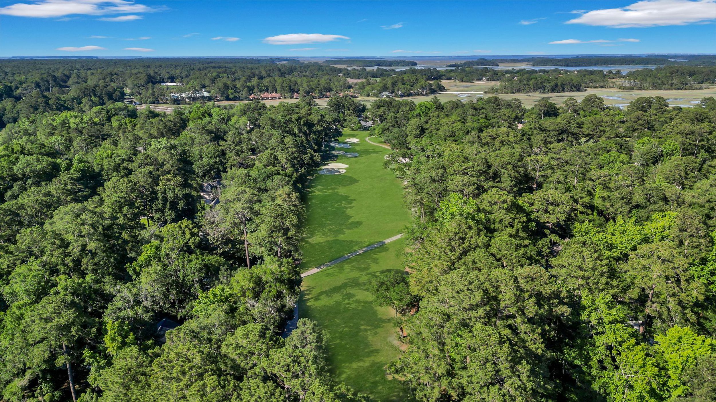 Luxury Moss Creek golf course home featuring 4 bedrooms and spacious outdoor deck